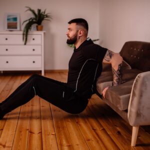 Person doing a bodyweight workout at home with no equipment