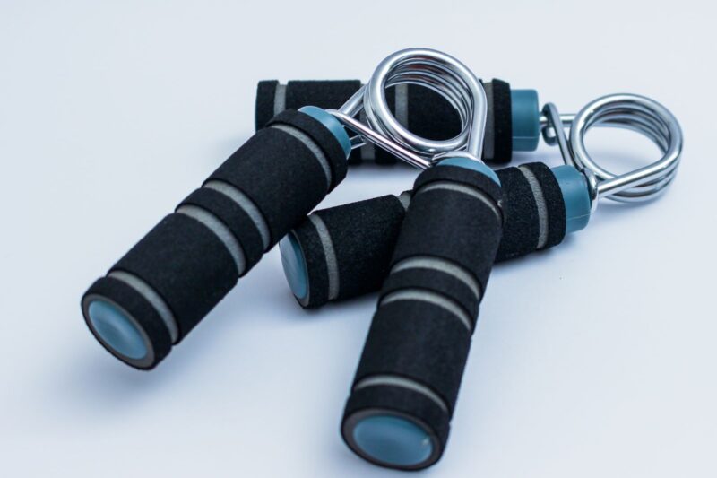 FitBeast Grip Strengthener Review: Adjustable, Portable, and Perfect for Forearm Training.
